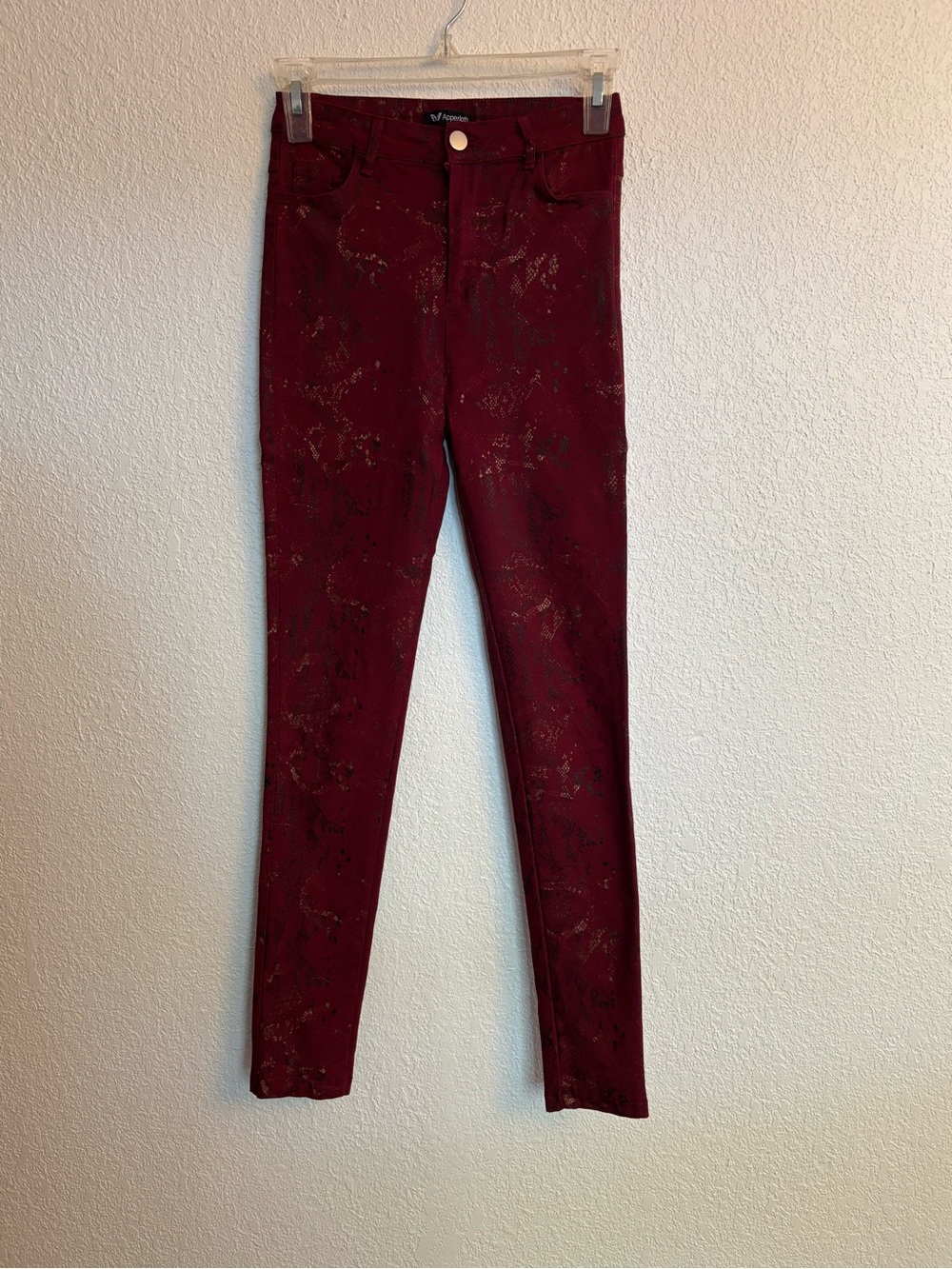Burgundy Skinny Jeans with Subtle Metallic Detail